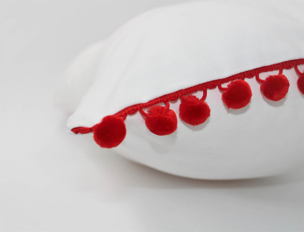 El Mar Pillow Collection: White with Red Pom Poms