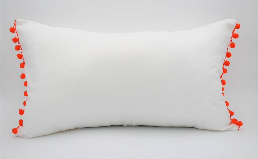 El Mar Pillow Collection: White with Orange Pom Poms