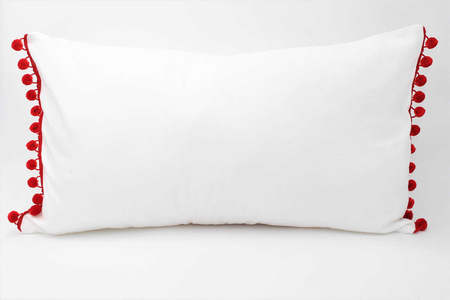 El Mar Pillow Collection: White with Red Pom Poms